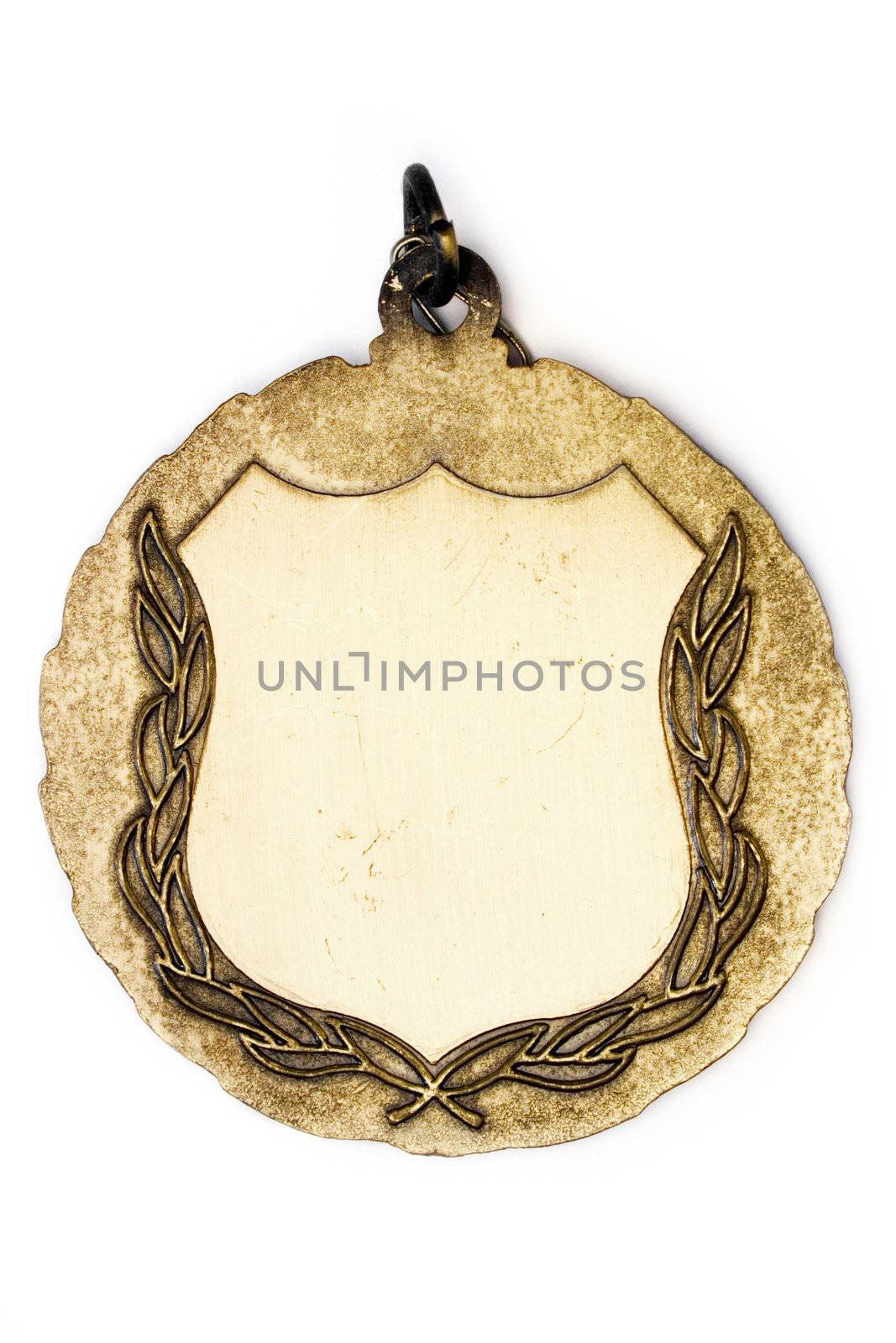Blank gold medal isolated on a white background.