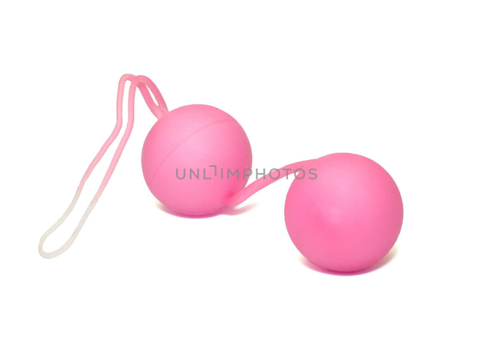 Pink vaginal balls it is isolated on a white background.