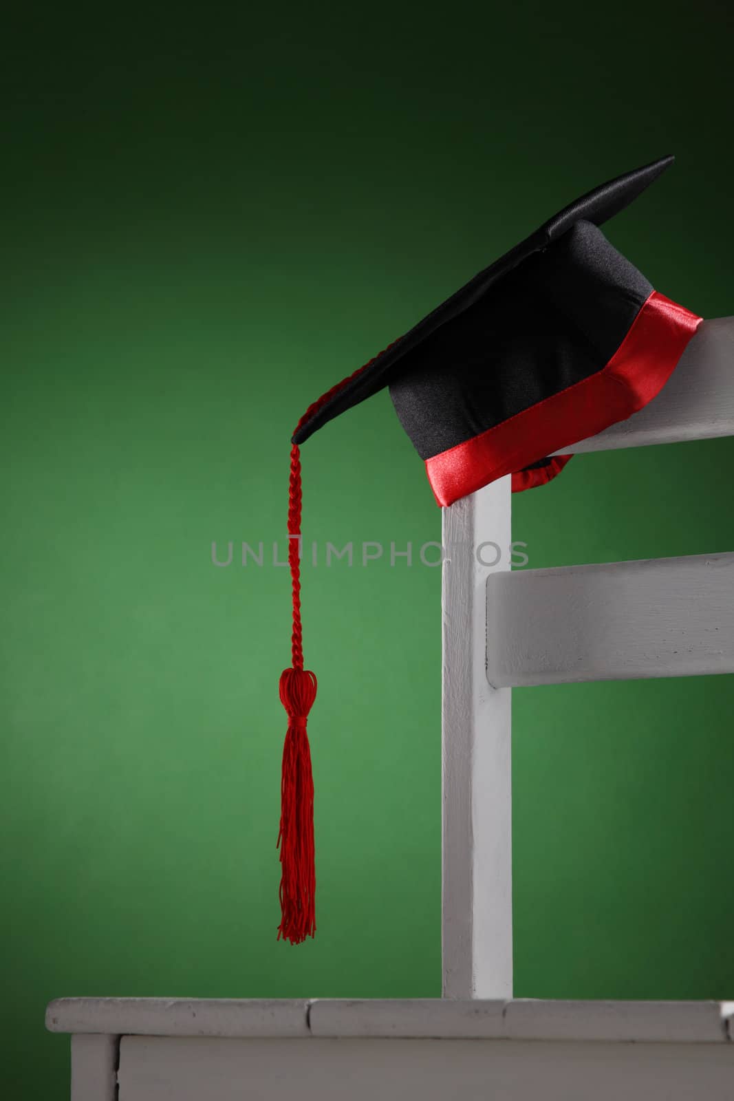 mortar board on the chair