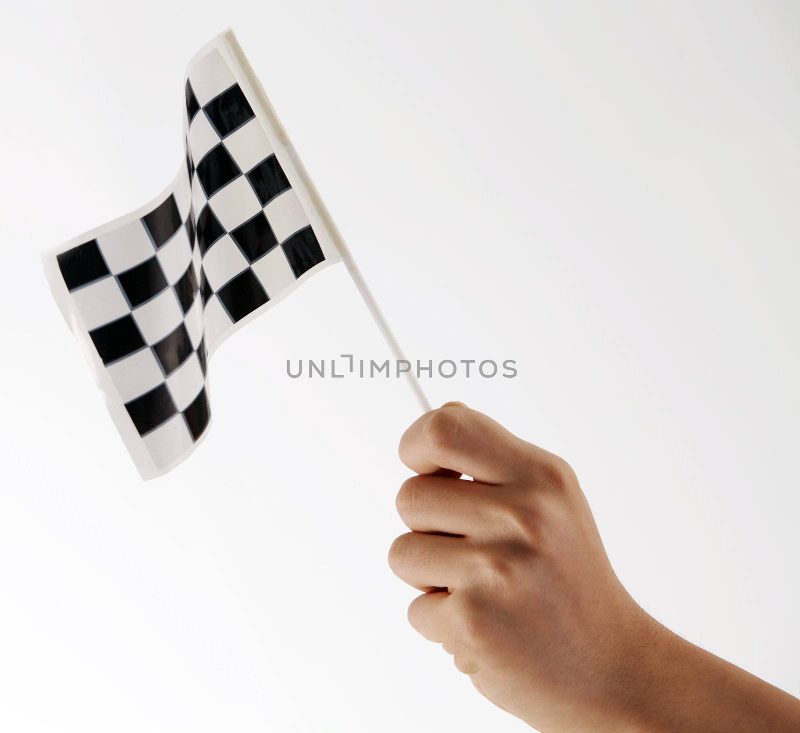 hand holding a mini checker flag