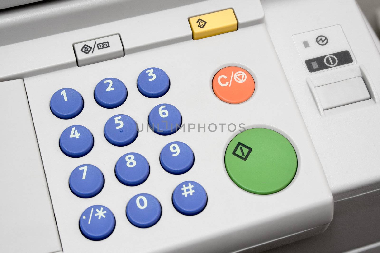 Close-up on a control panel of an office copier.