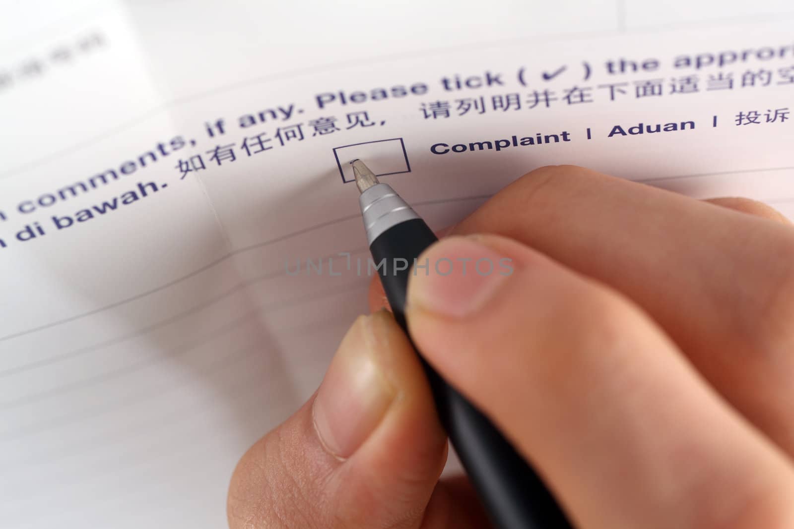 pen marking check boxes about complaint
