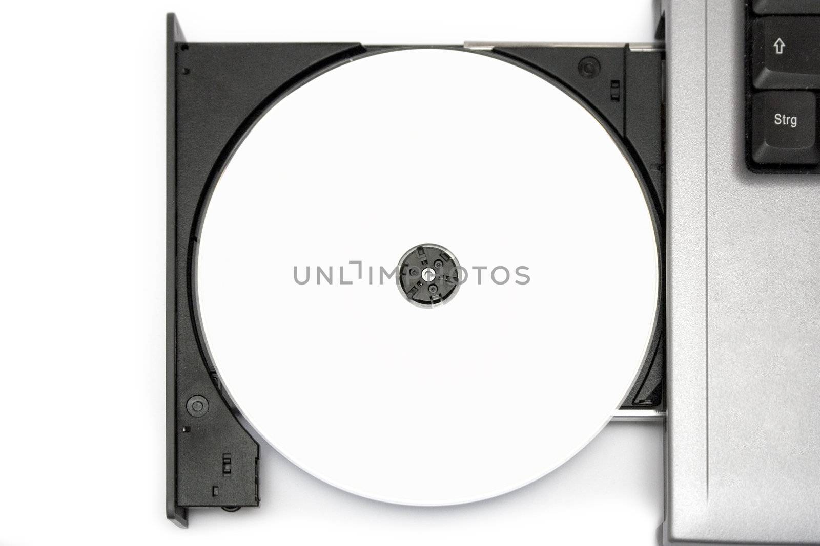 Top view on a blank CD in a notebook drive. White background.