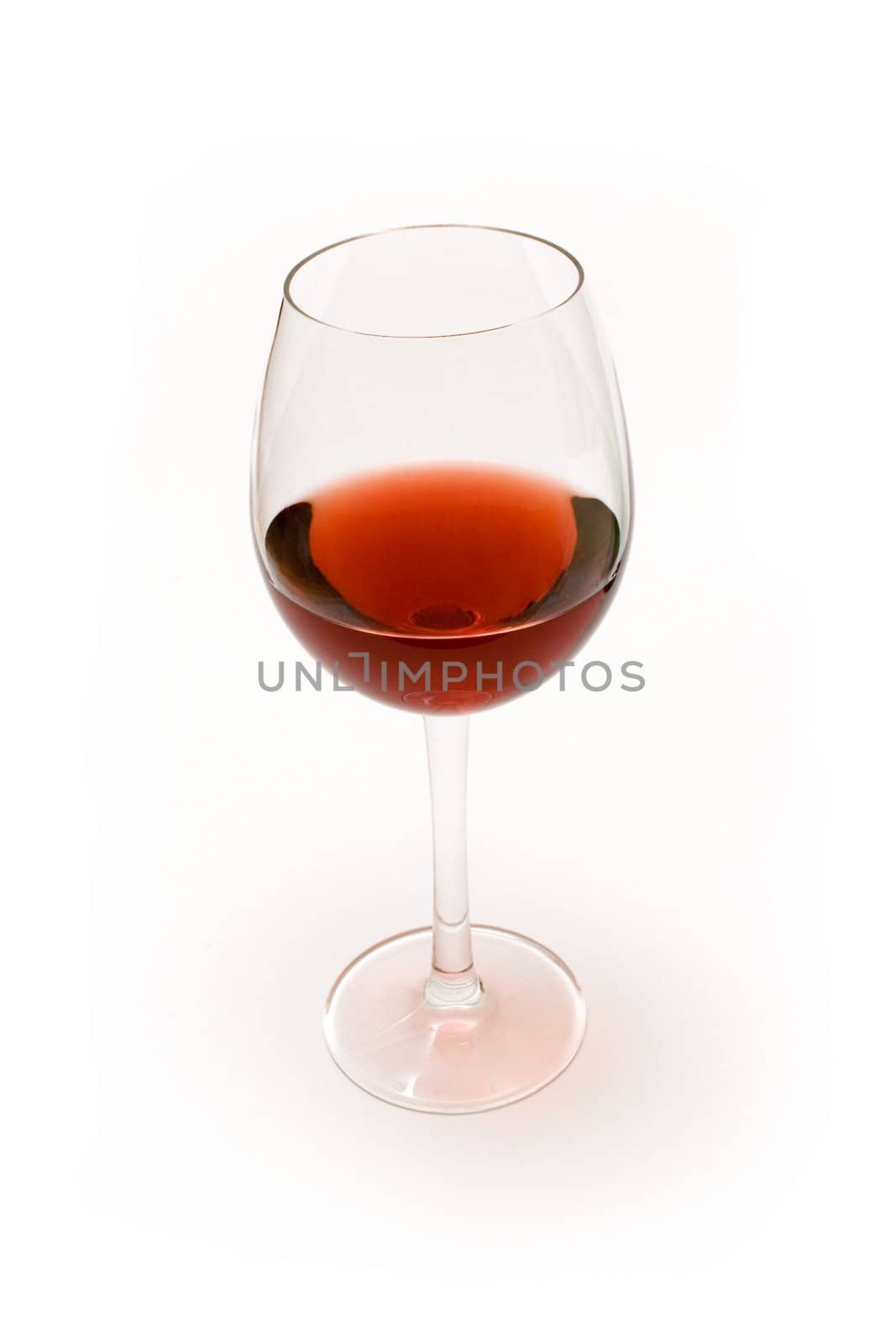 Glass of red wine isolated on a white background.