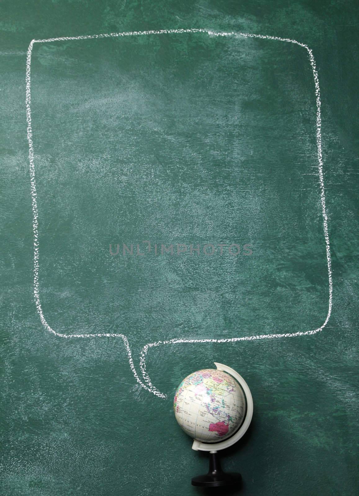 globe on the blackboard with the speech bubble