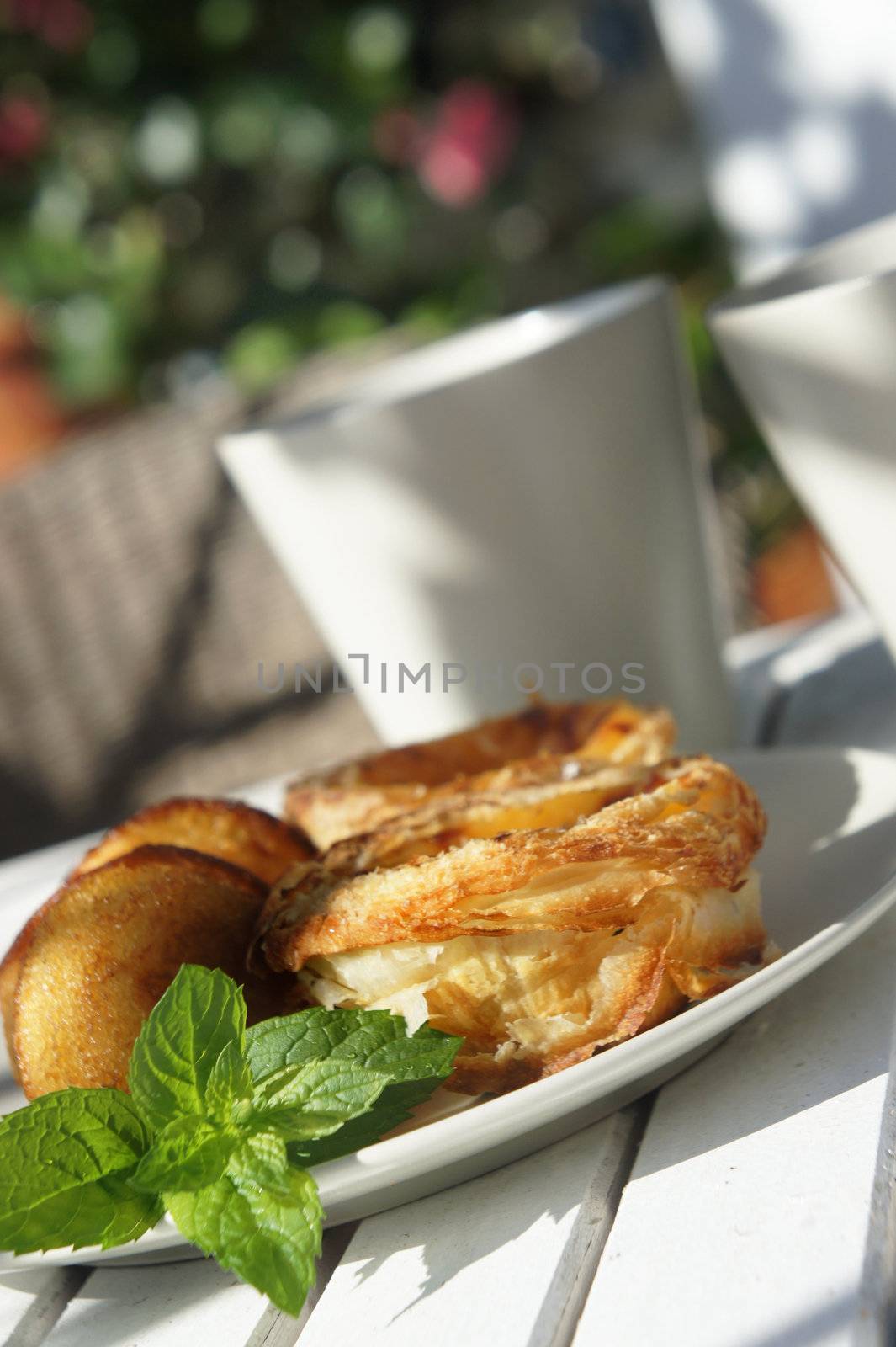 Sweet cakes and beautiful rich decorated summer terrace     