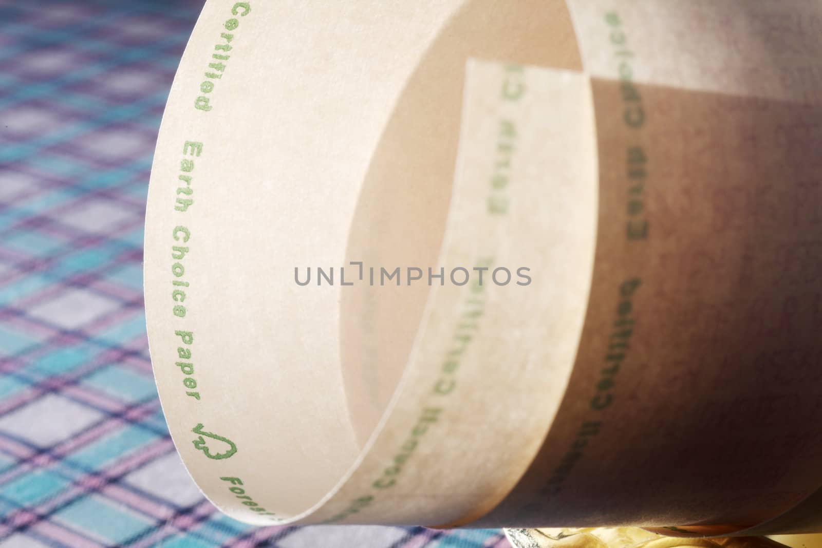 paper roll with printout on the table cloth 