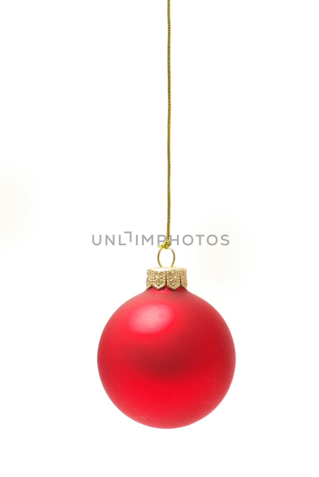 Christmas ball hanging with ribbons on white background