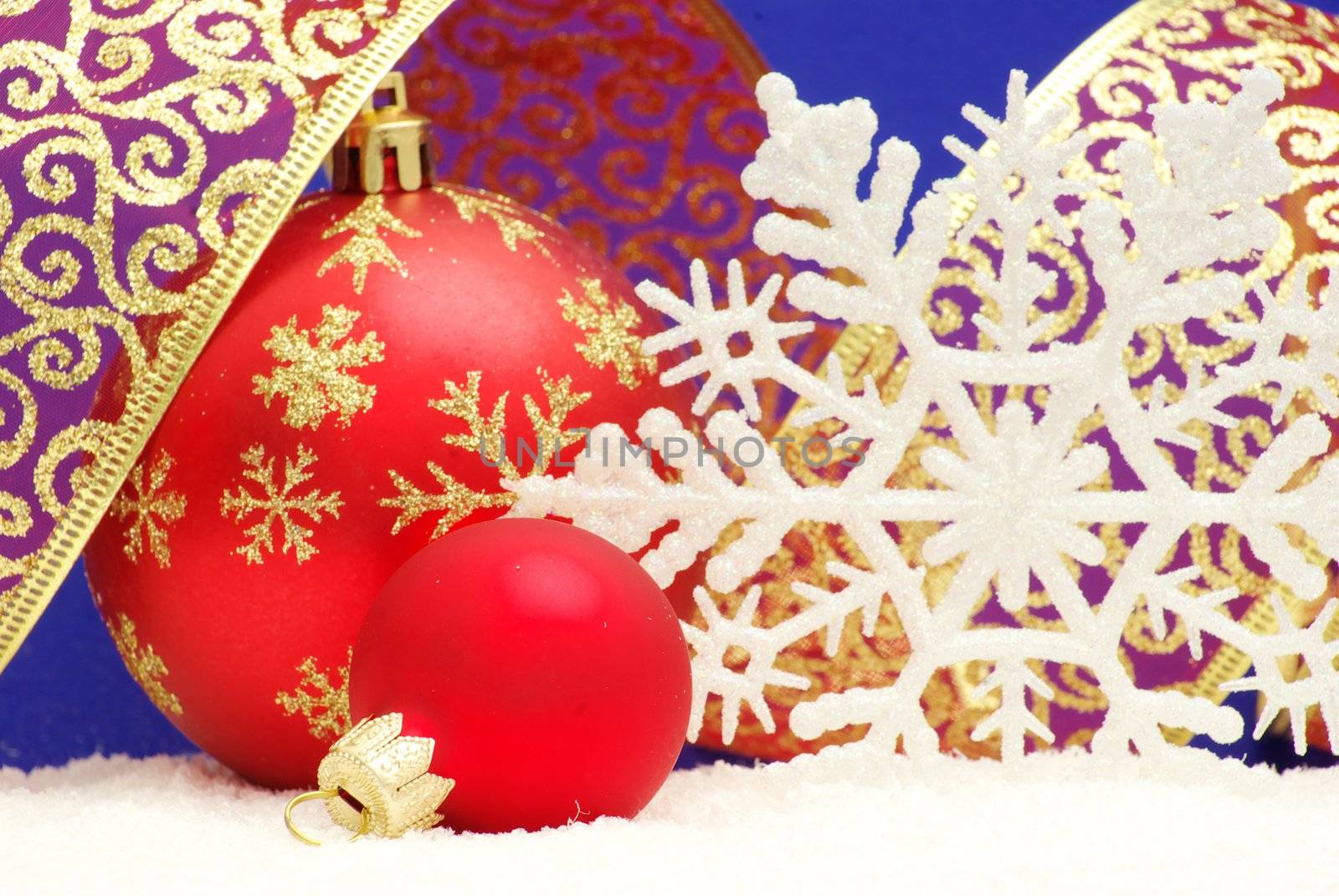 Christmas balls isolated on the blue background