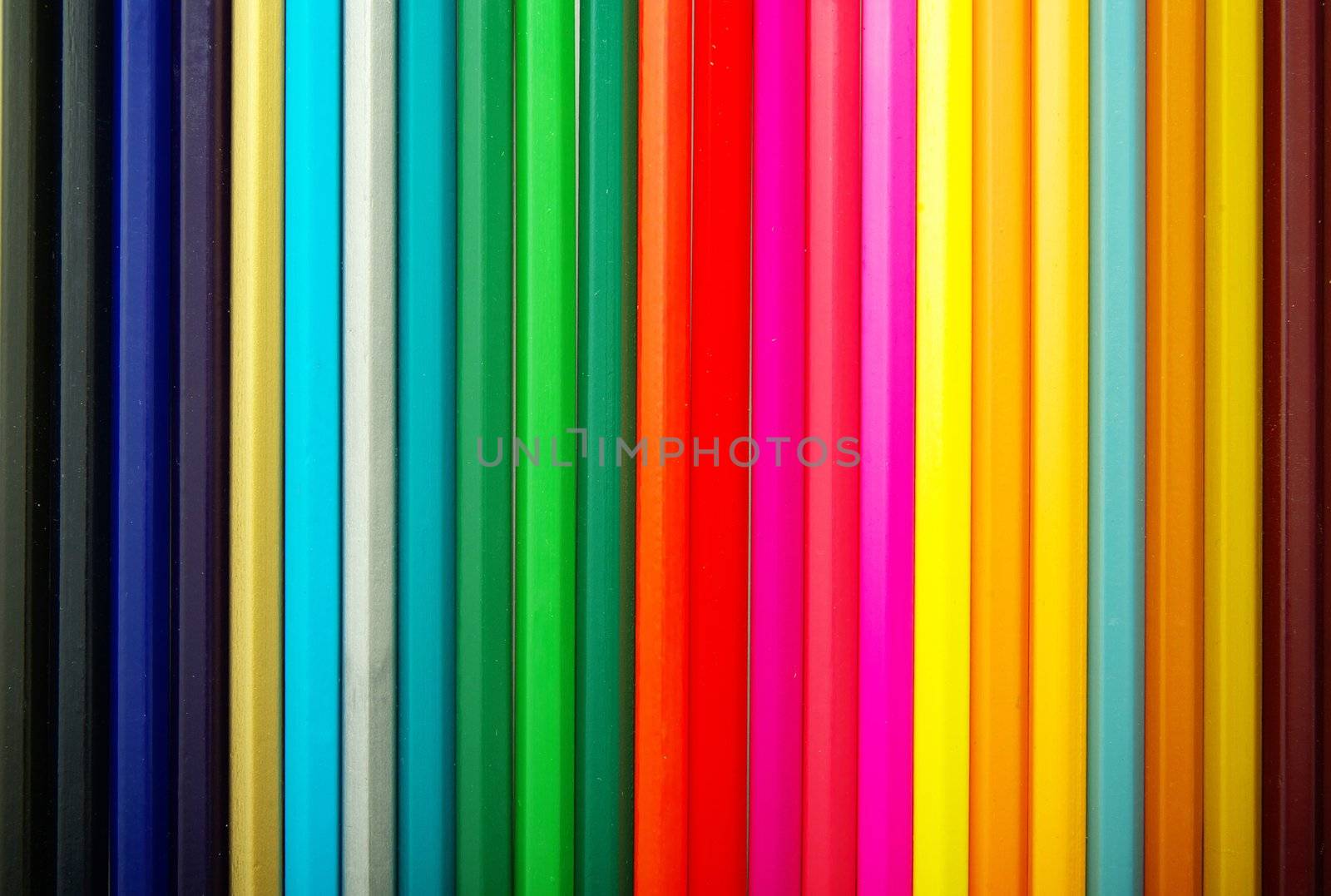 Assortment of coloured pencils  on white background