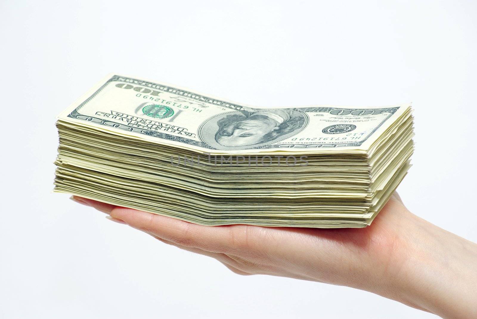 Hand with money isolated on white background
