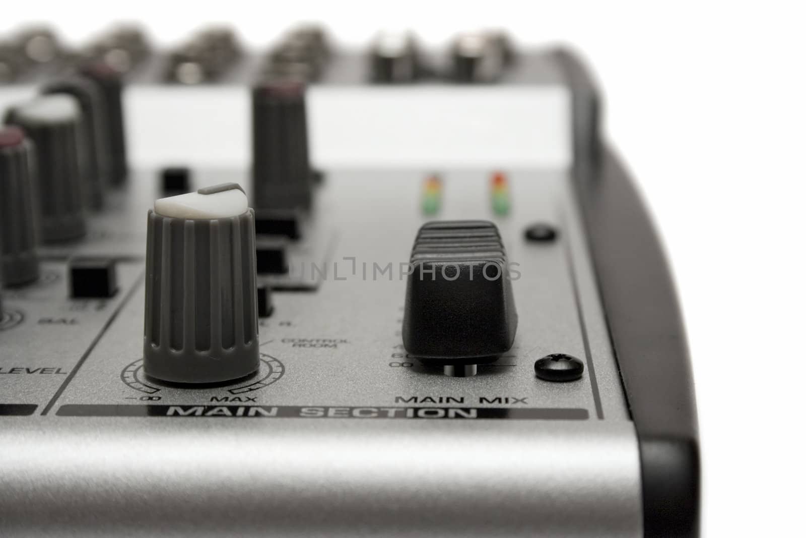 Close-up on a mixing desk isolated on a white background.