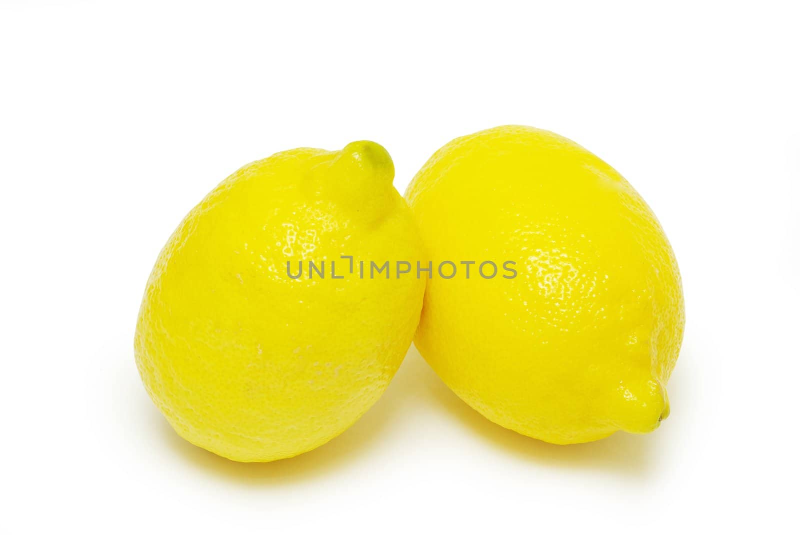 yellow fresh lemons isolated on a white