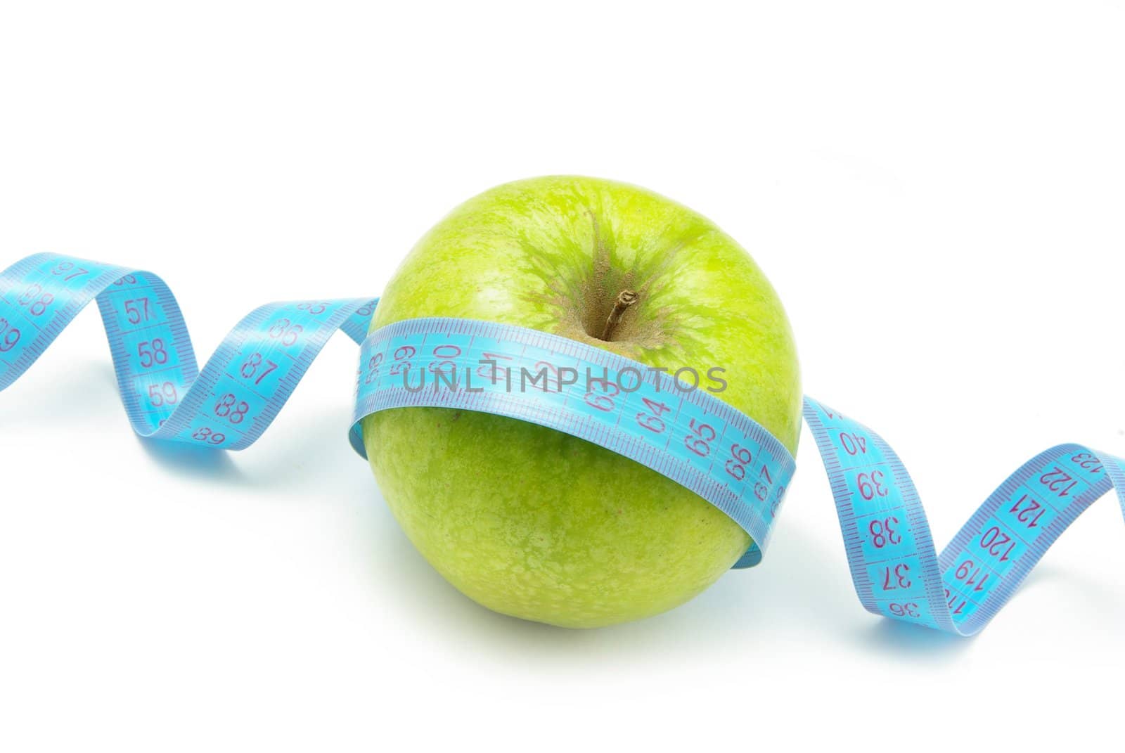  apple and measuring tape on white