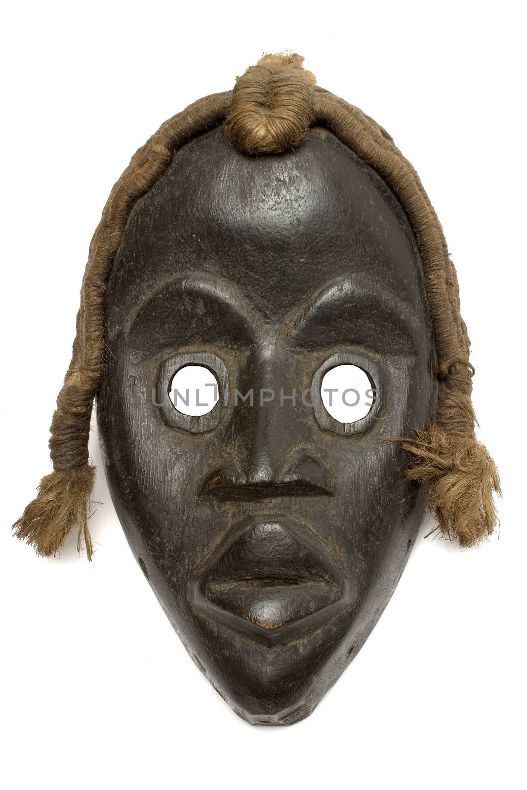 Antique mask isolated on a white background. File contains clipping path.