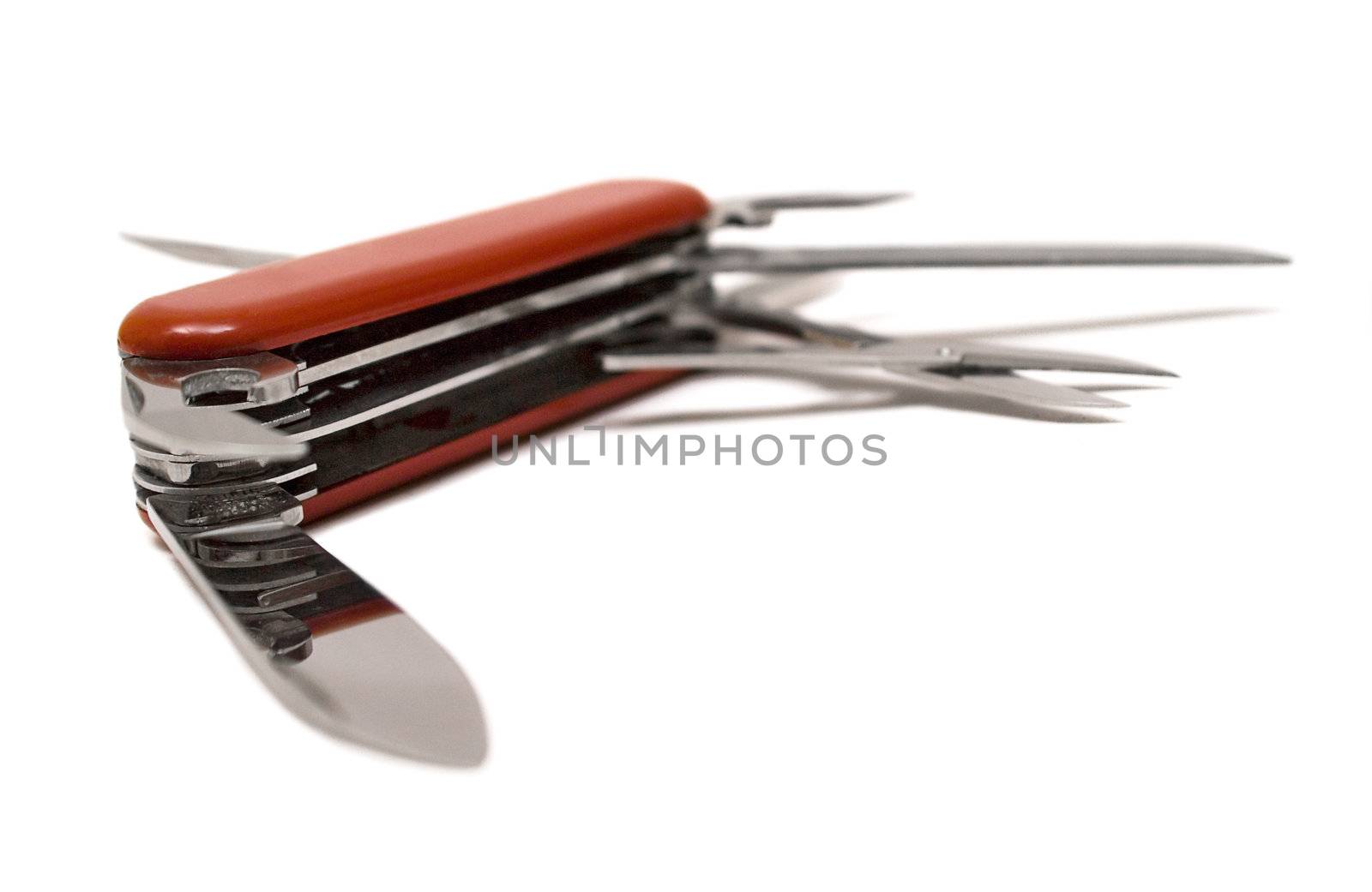 Open multitool penknife isolated on a white background.