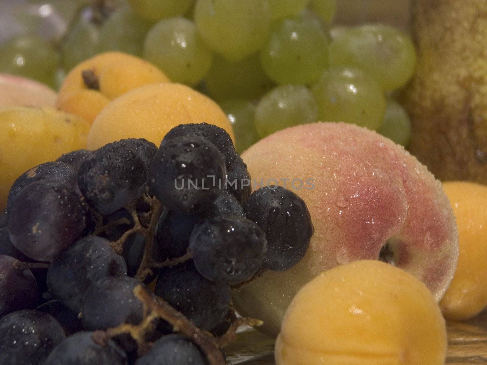 Different fruit with sparks of water