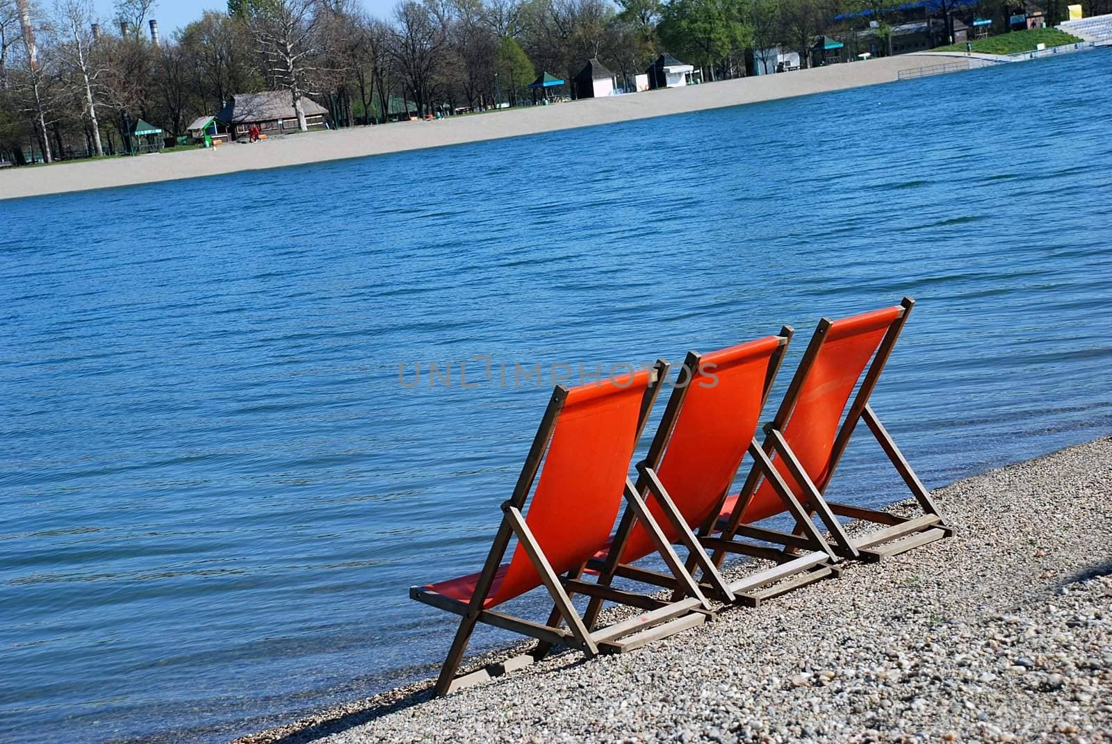 Orange folding chairs by simply