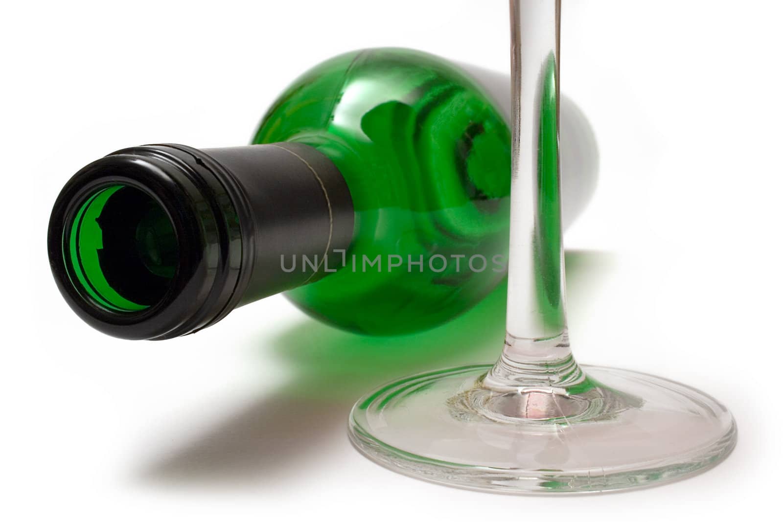 Drinking a bottle of wine. Isolated on a white background.