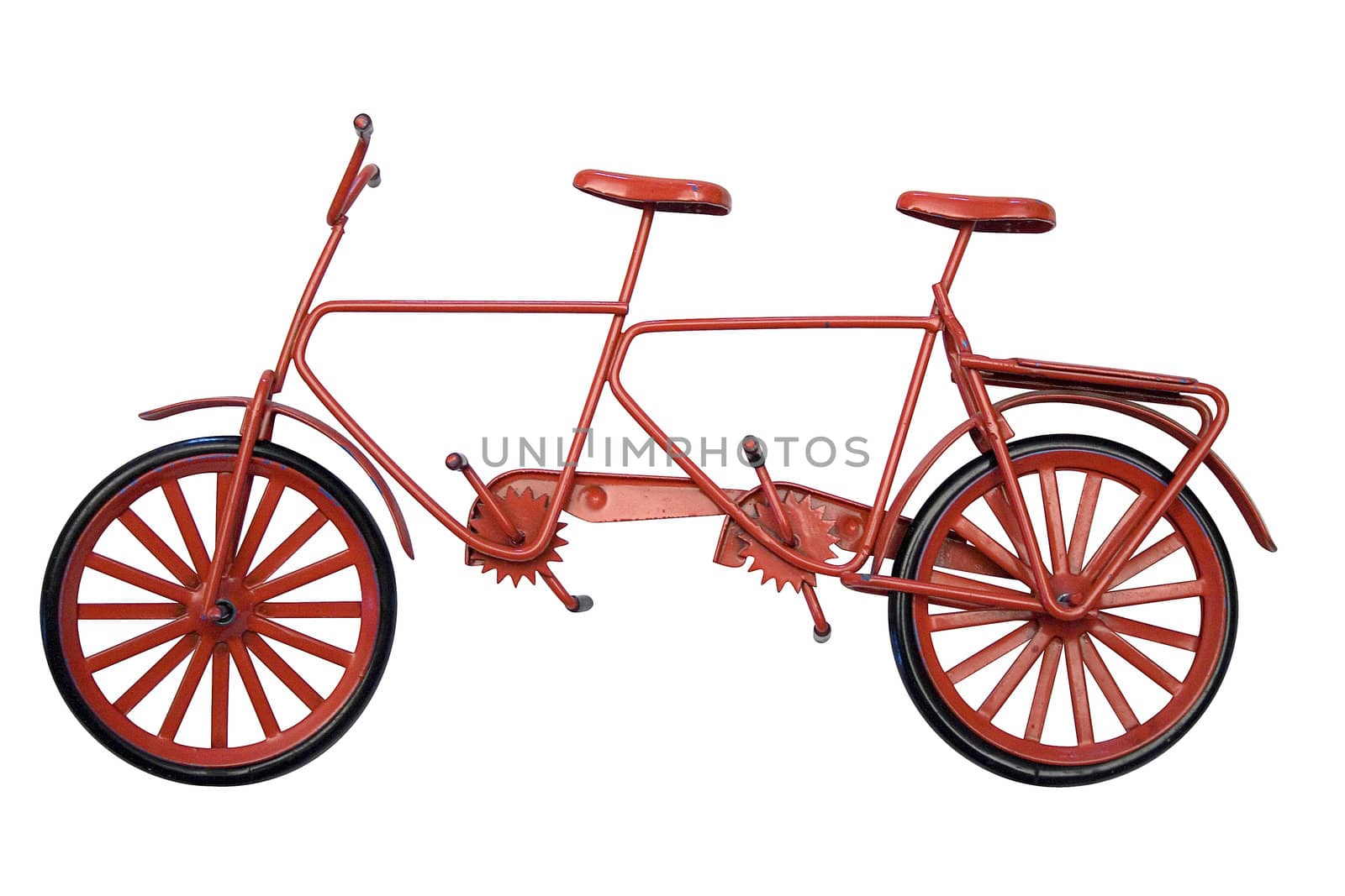 Red model of a tandem bicycle isolated on a white background. File contains clipping path.