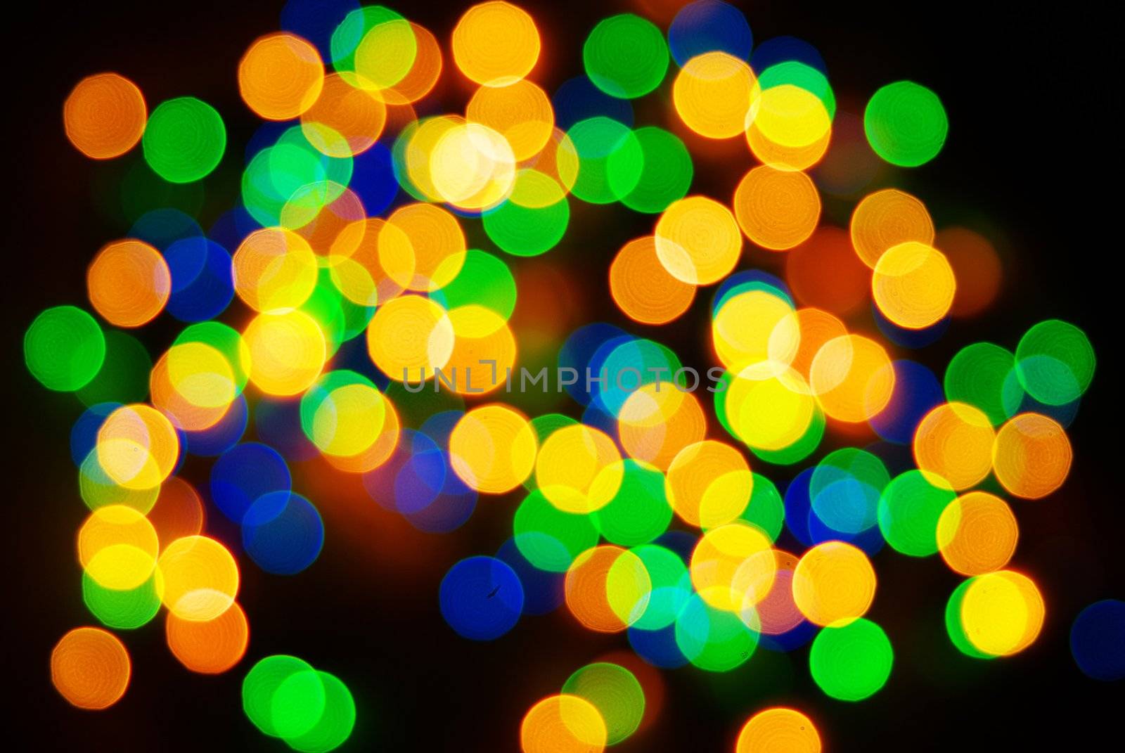 Abstract christmas lights as background on black