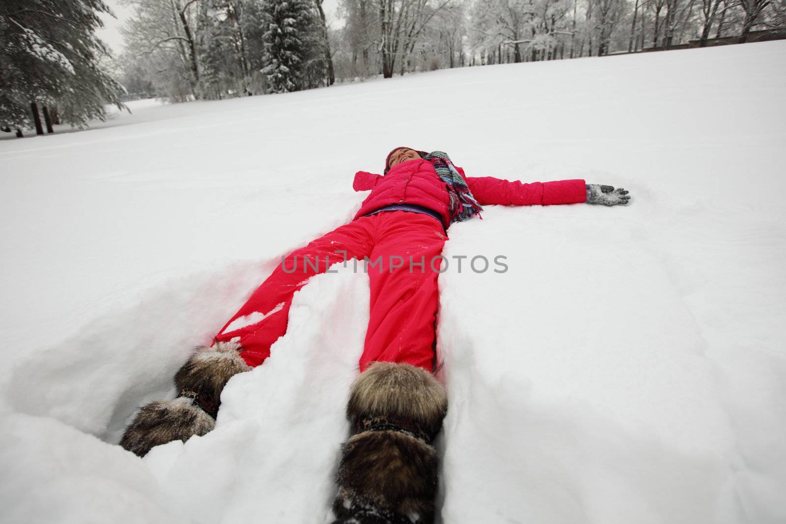 winter woman lay on snow