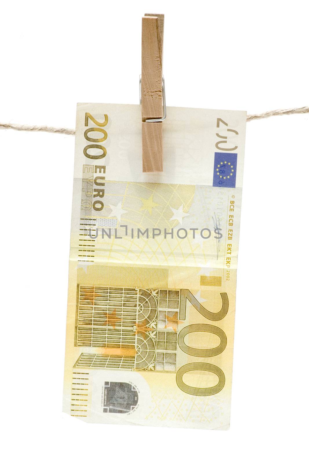 Yellow two hundred euro bill hanging on a clothesline. Isolated on
a white background.