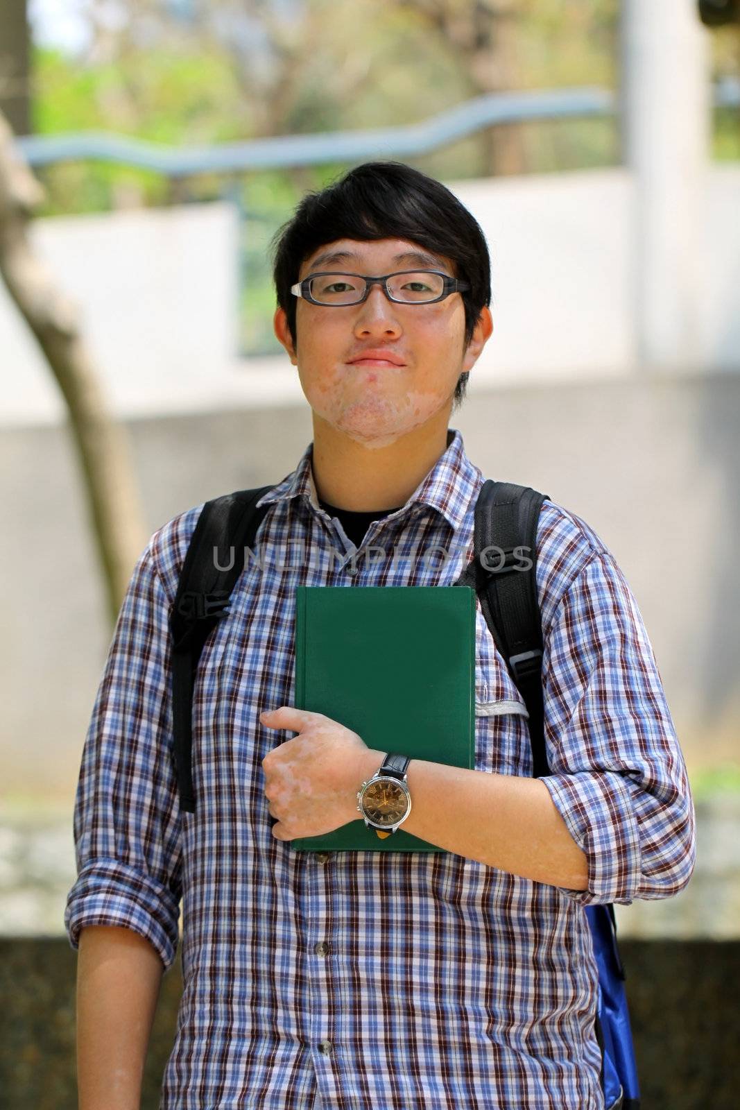 Asian university student boy