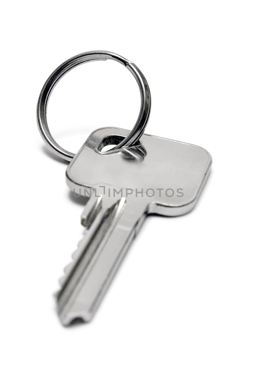 Apartment key isolated on a white background.