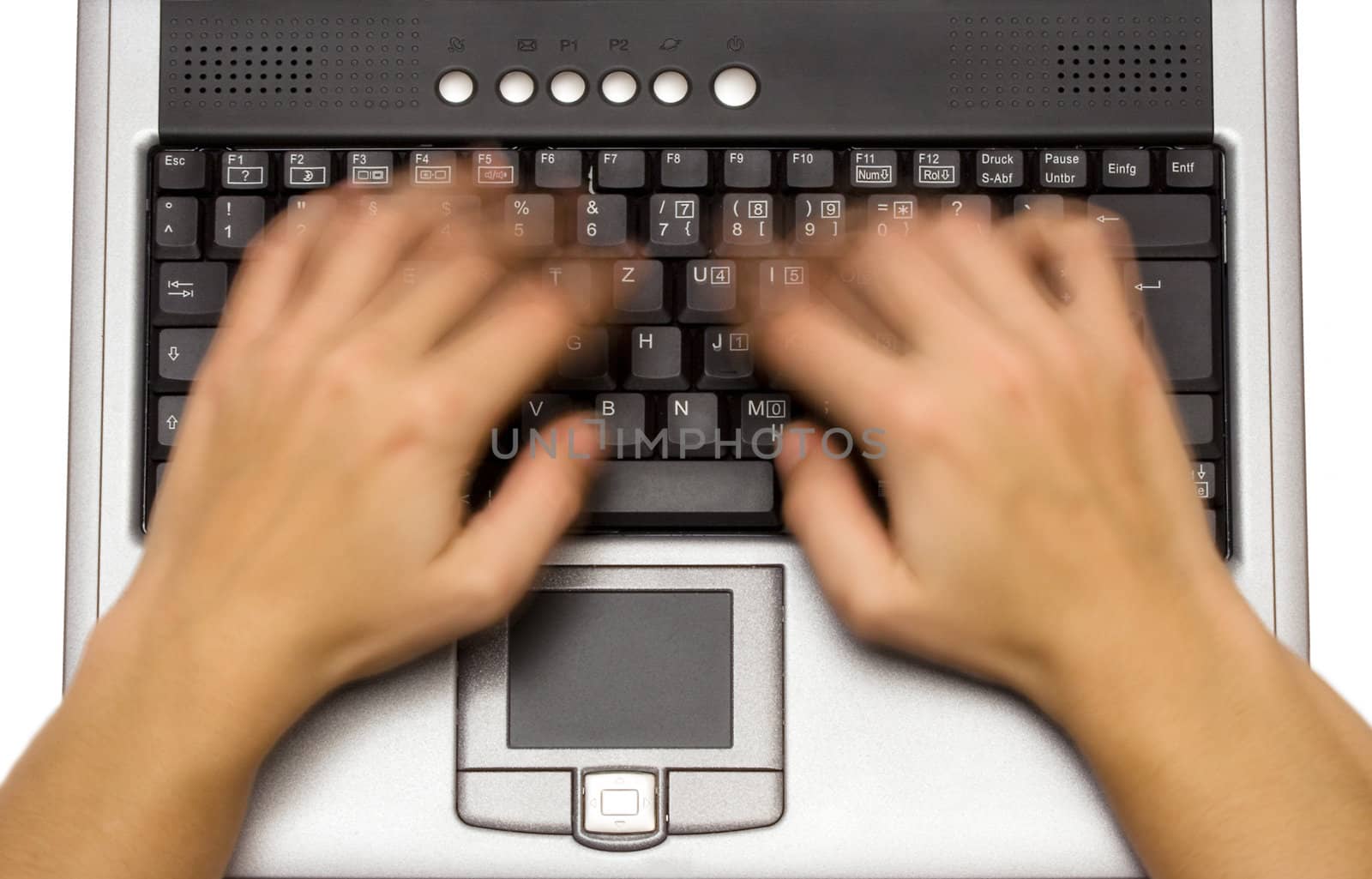 Woman writing on a laptop. Motion blur.