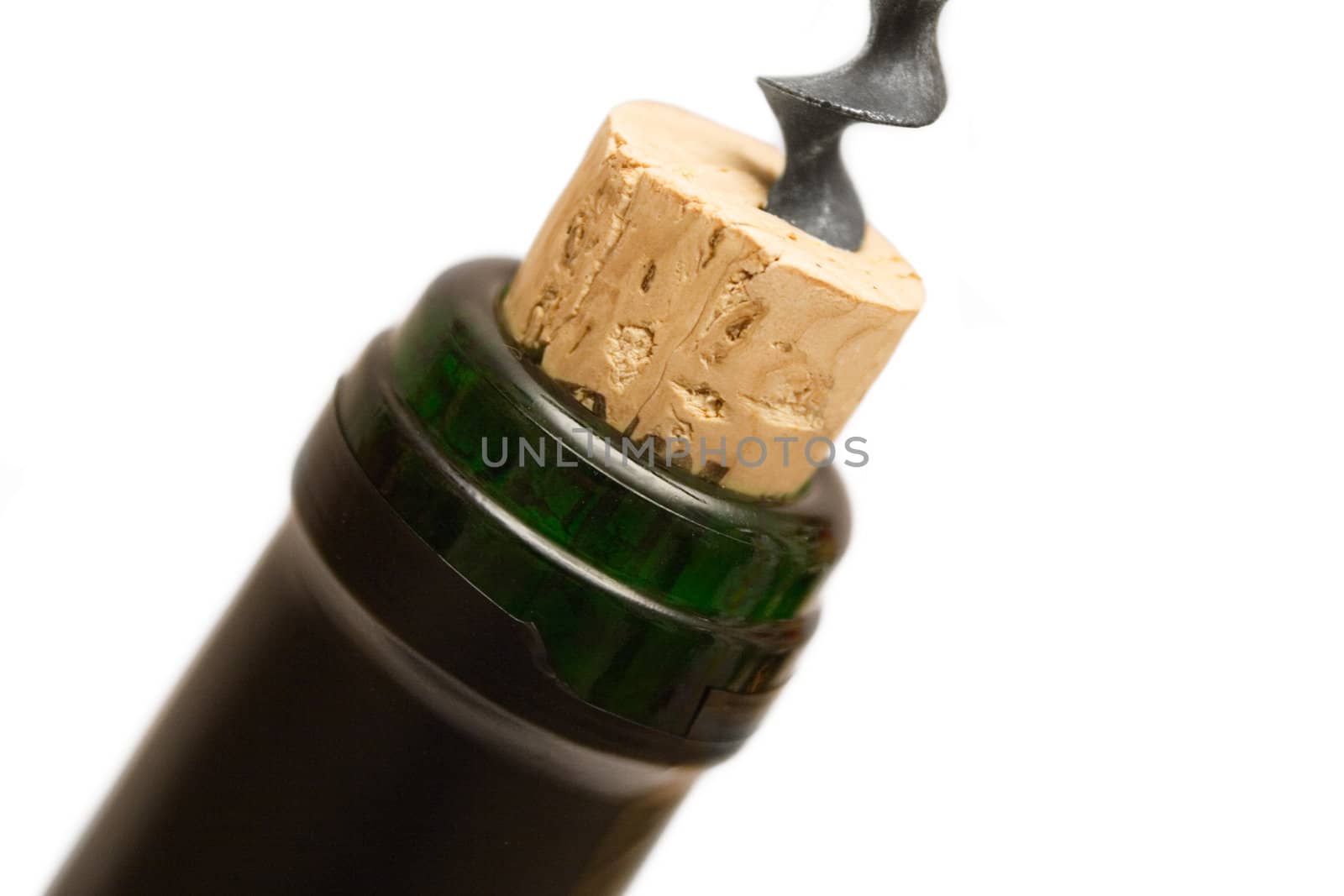 Opening a bottle of red wine. Isolated on a white background.