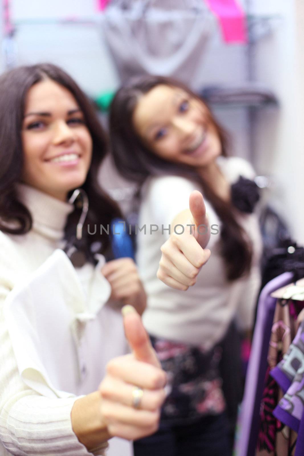 woman in shop look at clothes