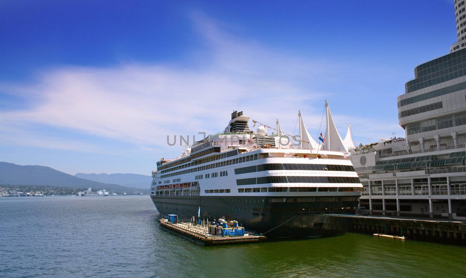 White luxury cruise ship in canadian harbour