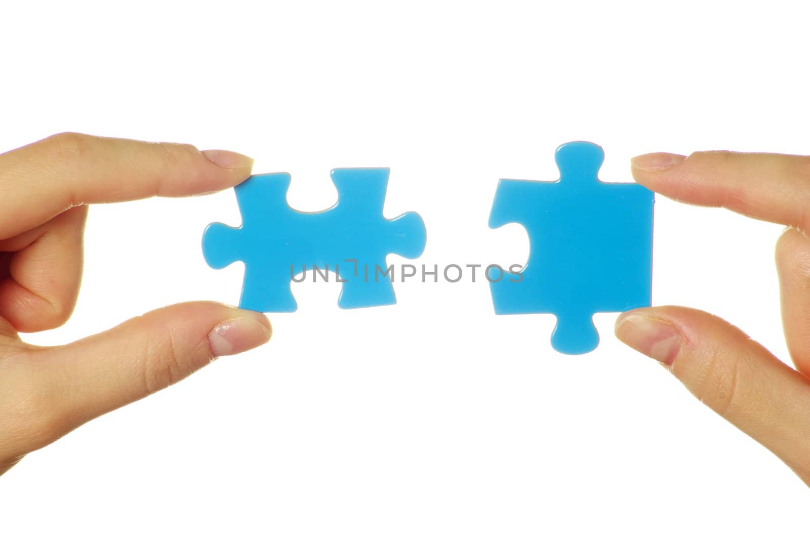  puzzle in hands isolated on white background