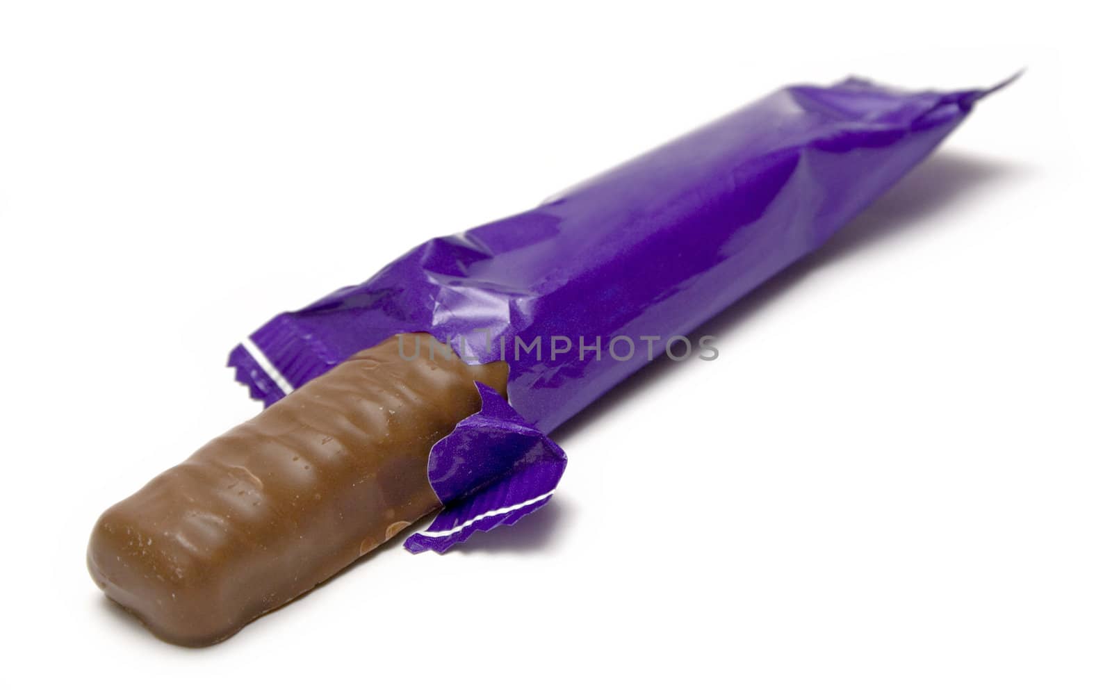 Wrapped chocolate bar isolated on a white background.