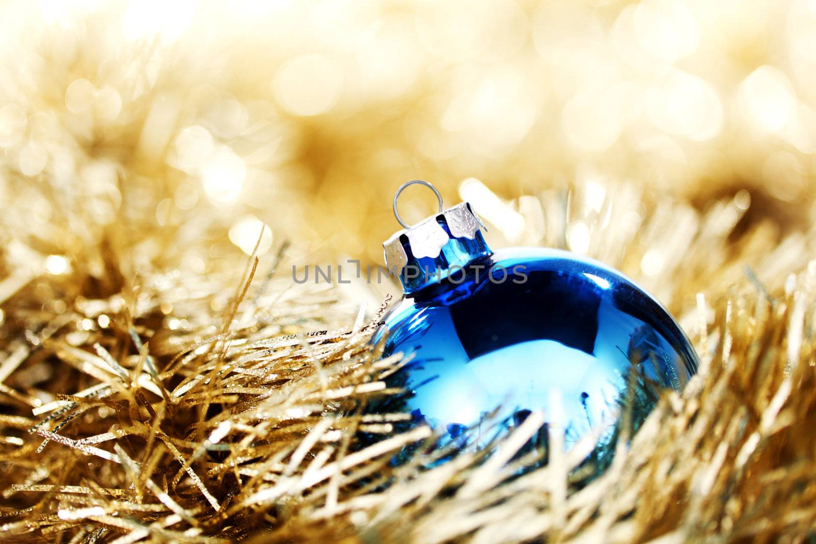  blue christmas ball on golden background