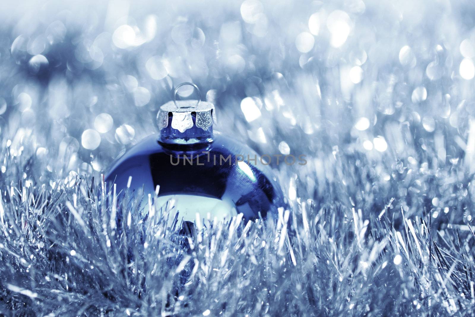 blue christmas ball on holiday background