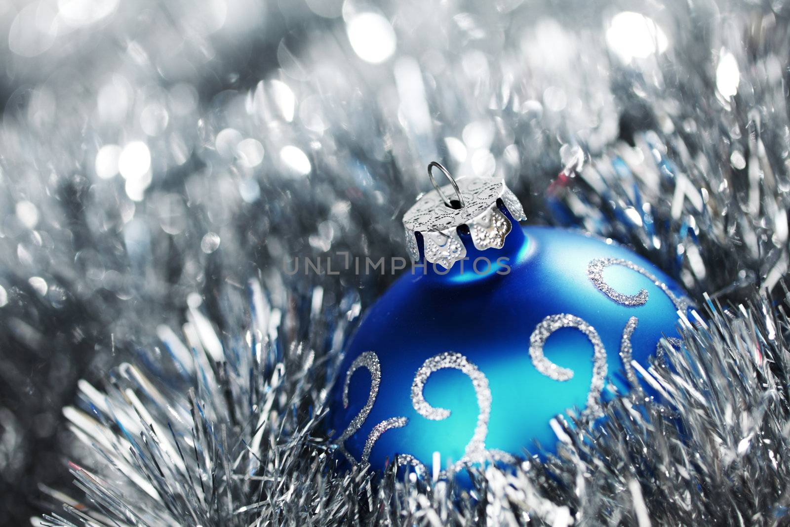 blue christmas ball on silver background