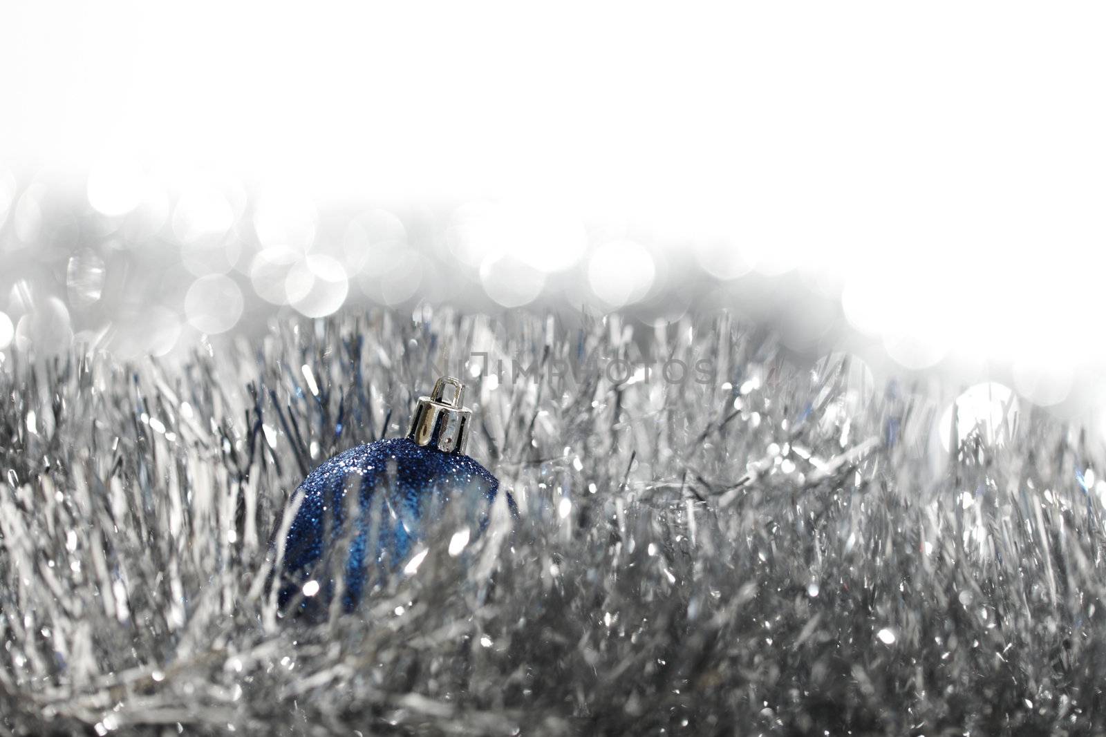 blue christmas ball on silver background