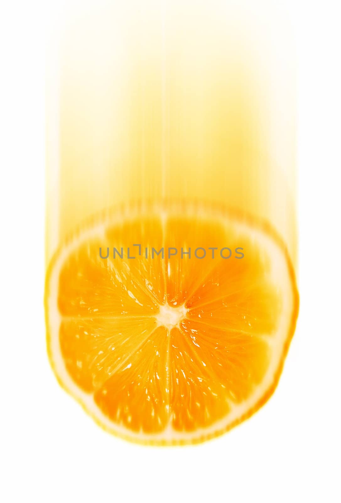 Falling orange slice with motion blur isolated on a white background.