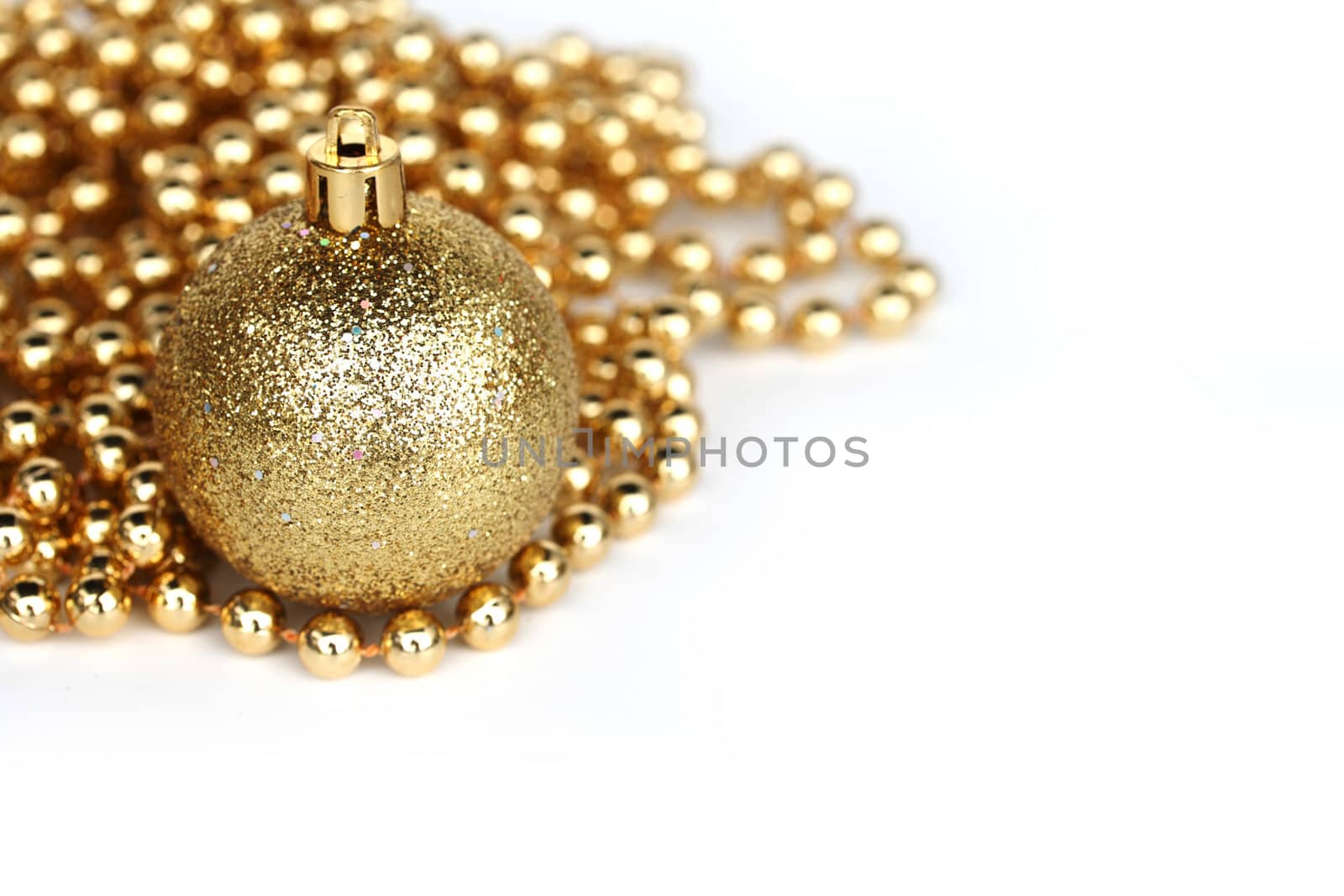  golden christmas ball isolated on white
