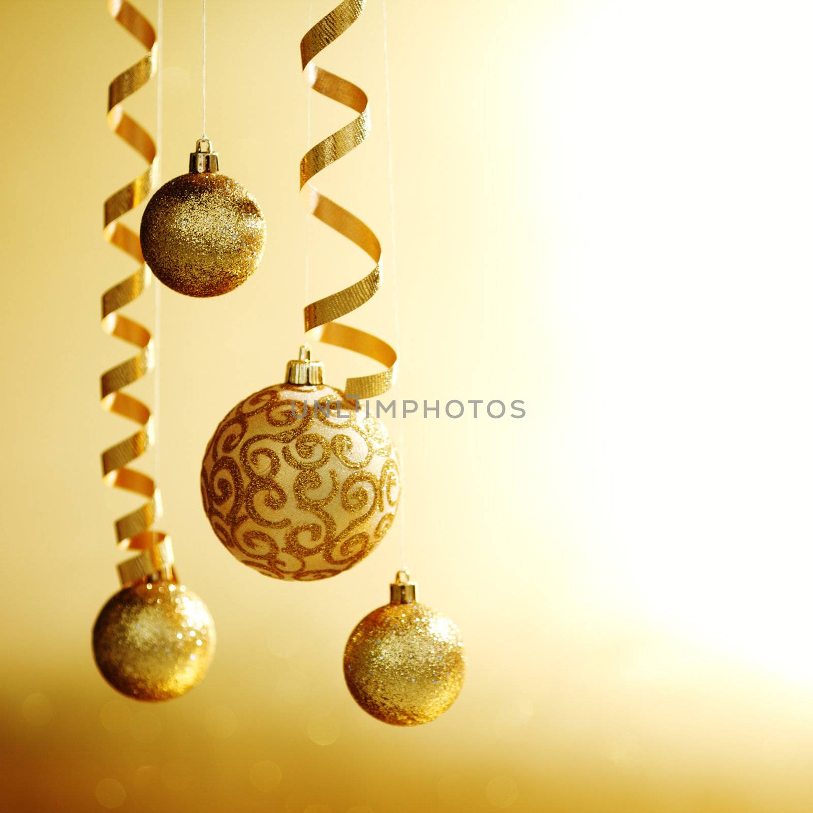 golden christmas balls on bokeh background