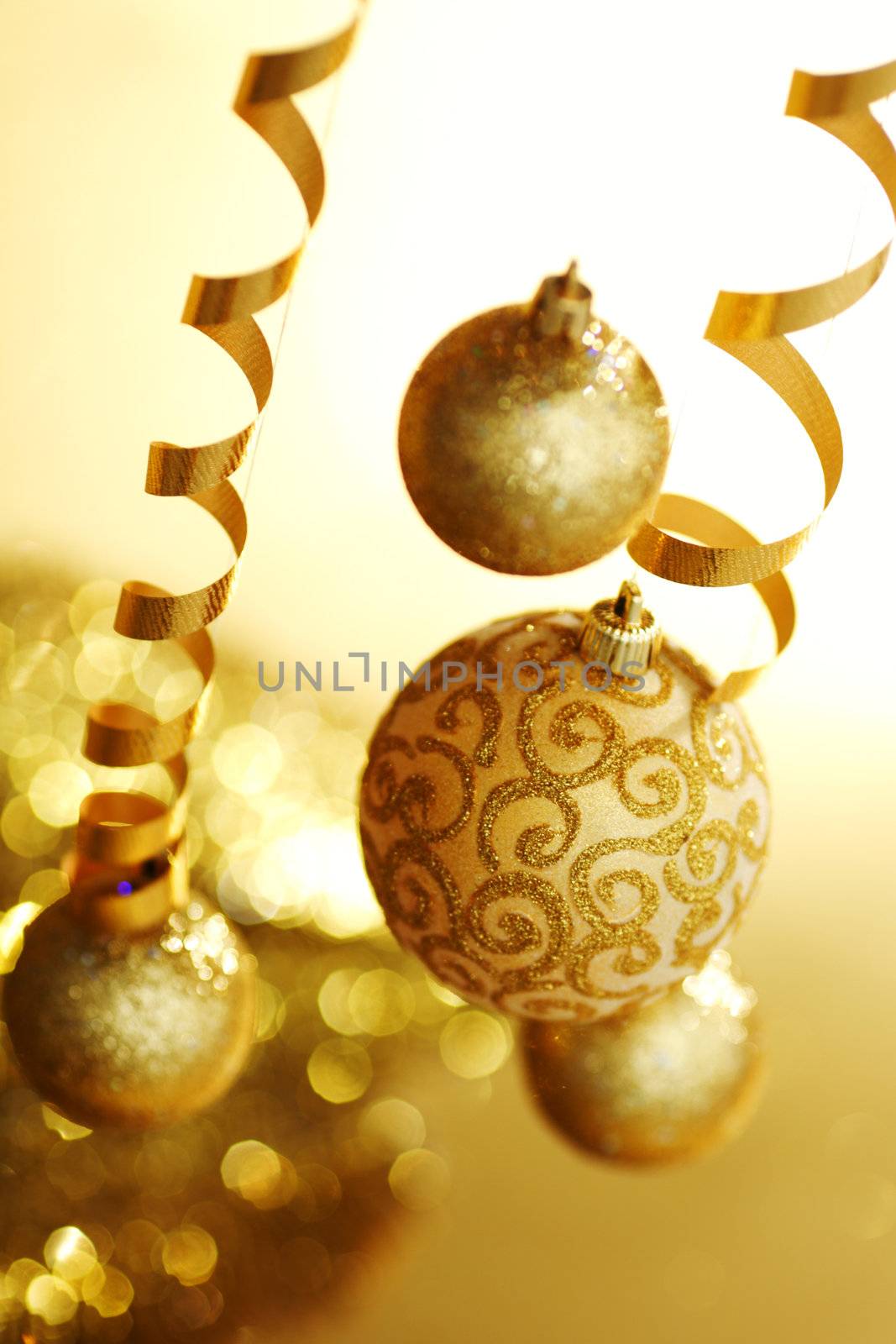 golden christmas balls on bokeh background