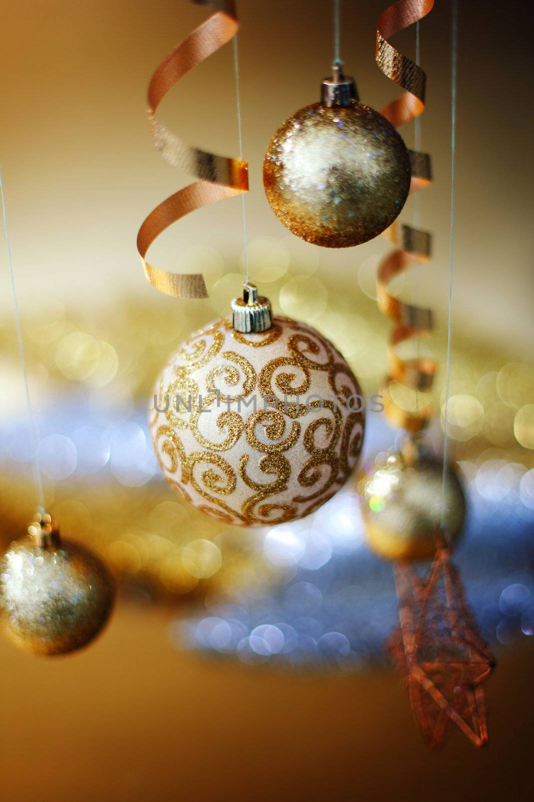 golden christmas balls on bokeh background