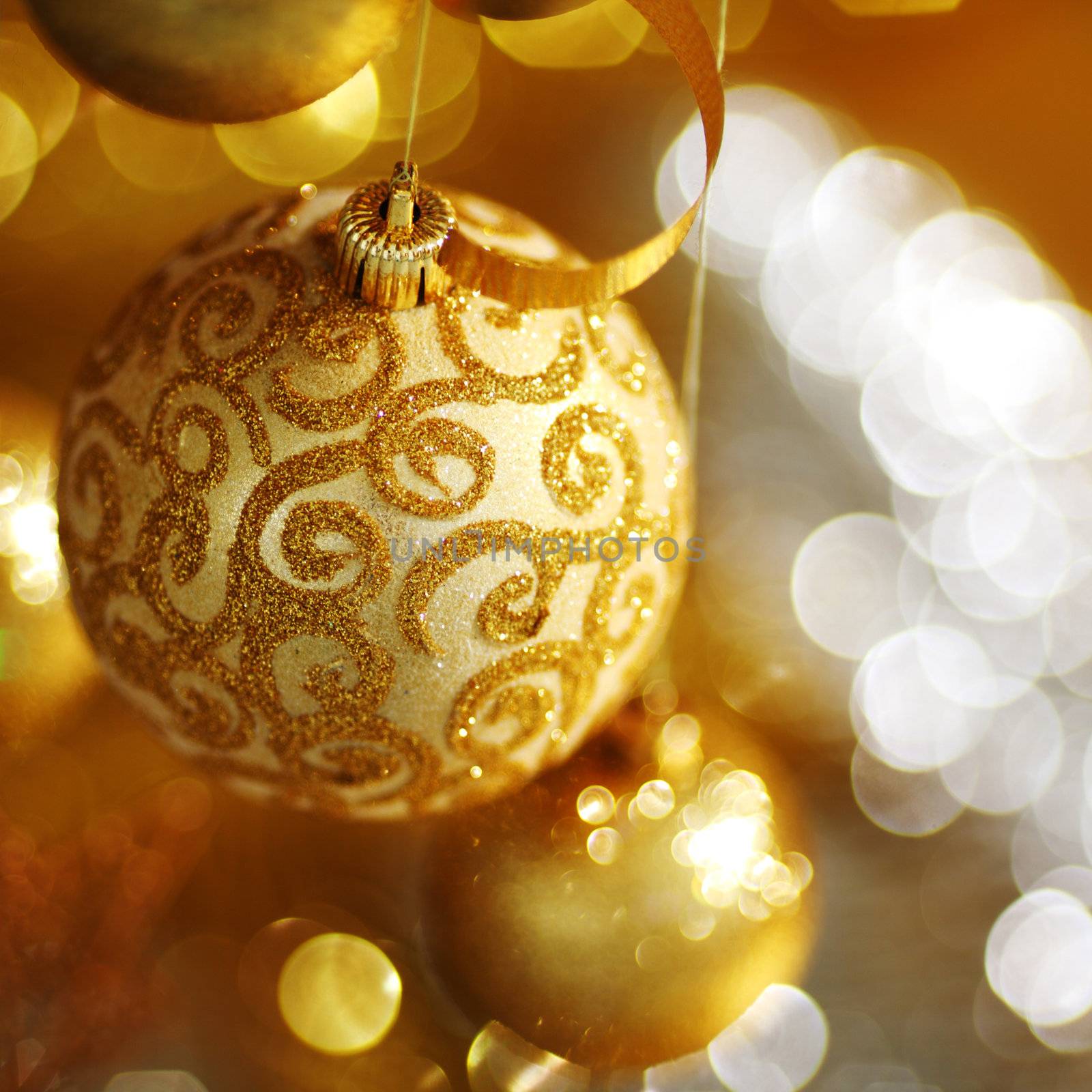 golden christmas balls on bokeh background