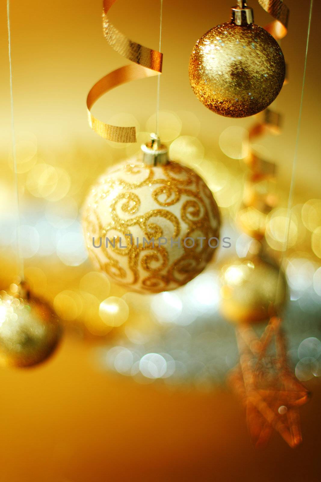 golden christmas balls on bokeh background