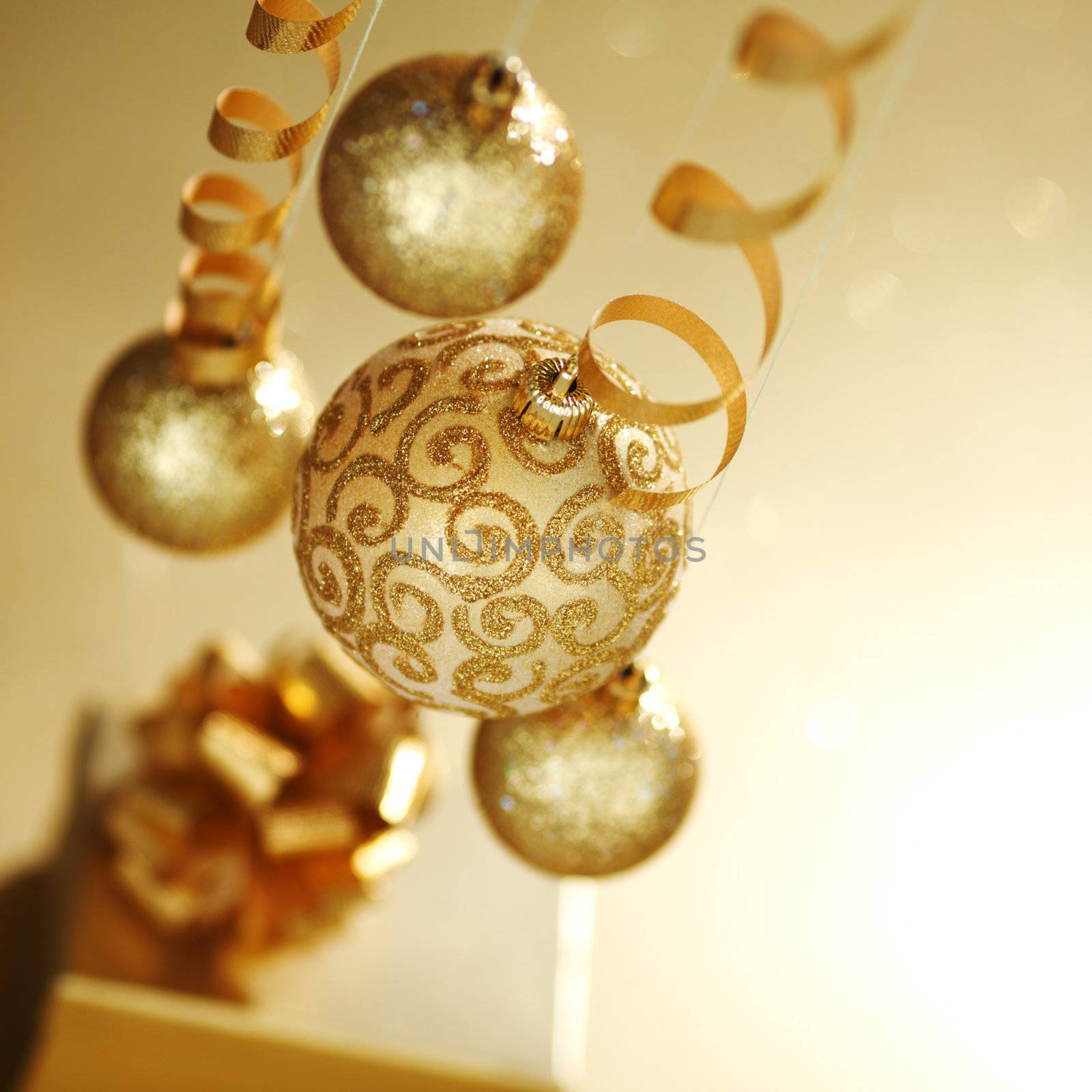 golden christmas balls on bokeh background