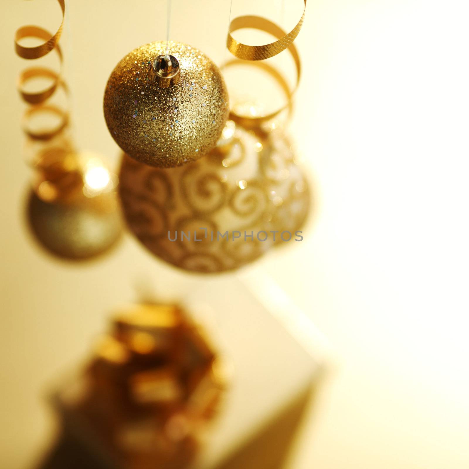 golden christmas balls on bokeh background