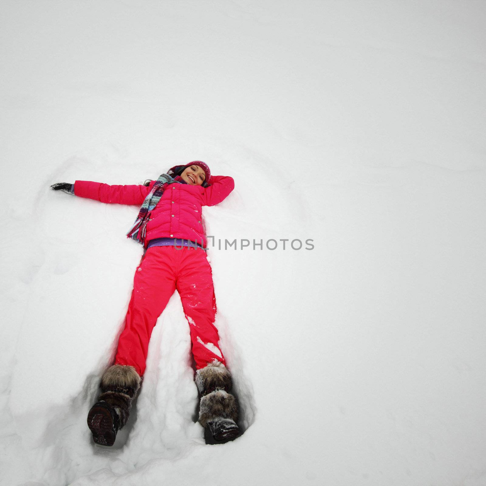 winter woman lay on snow