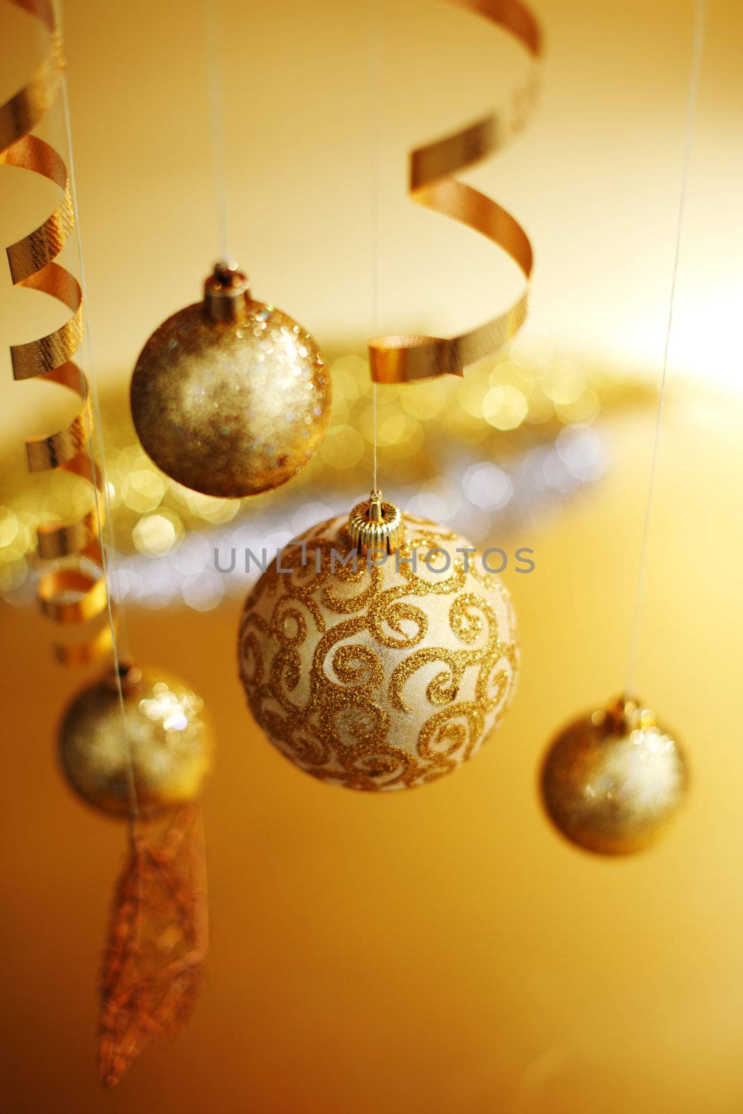 golden christmas balls on bokeh background